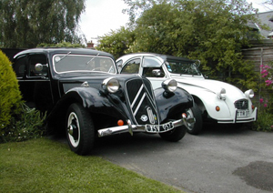 picture of two classic french cars